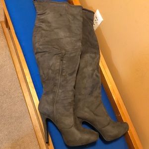 Knee high heeled boots